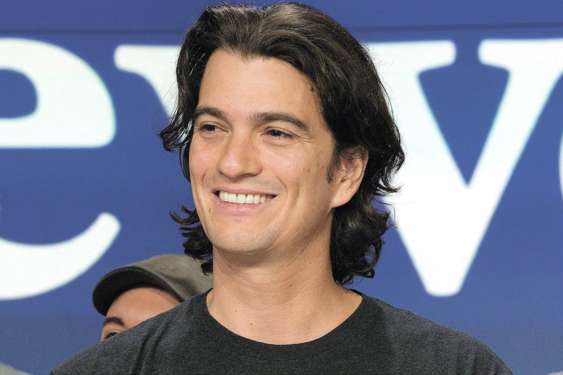 The former WeWork CEO is about to release a digital wallet that merchants cryptocurrency