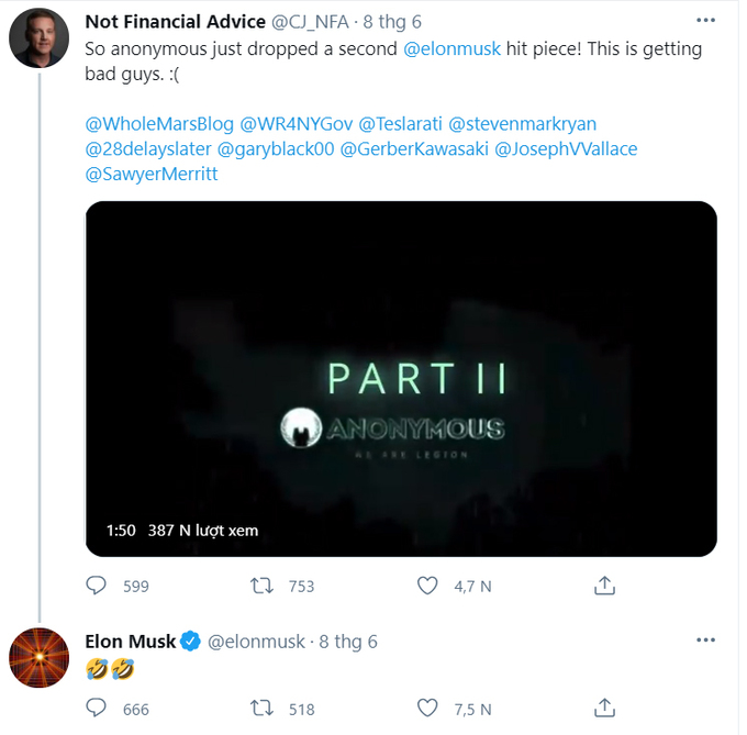 Elon Musk laughs while watching a video impersonating Anonymous.